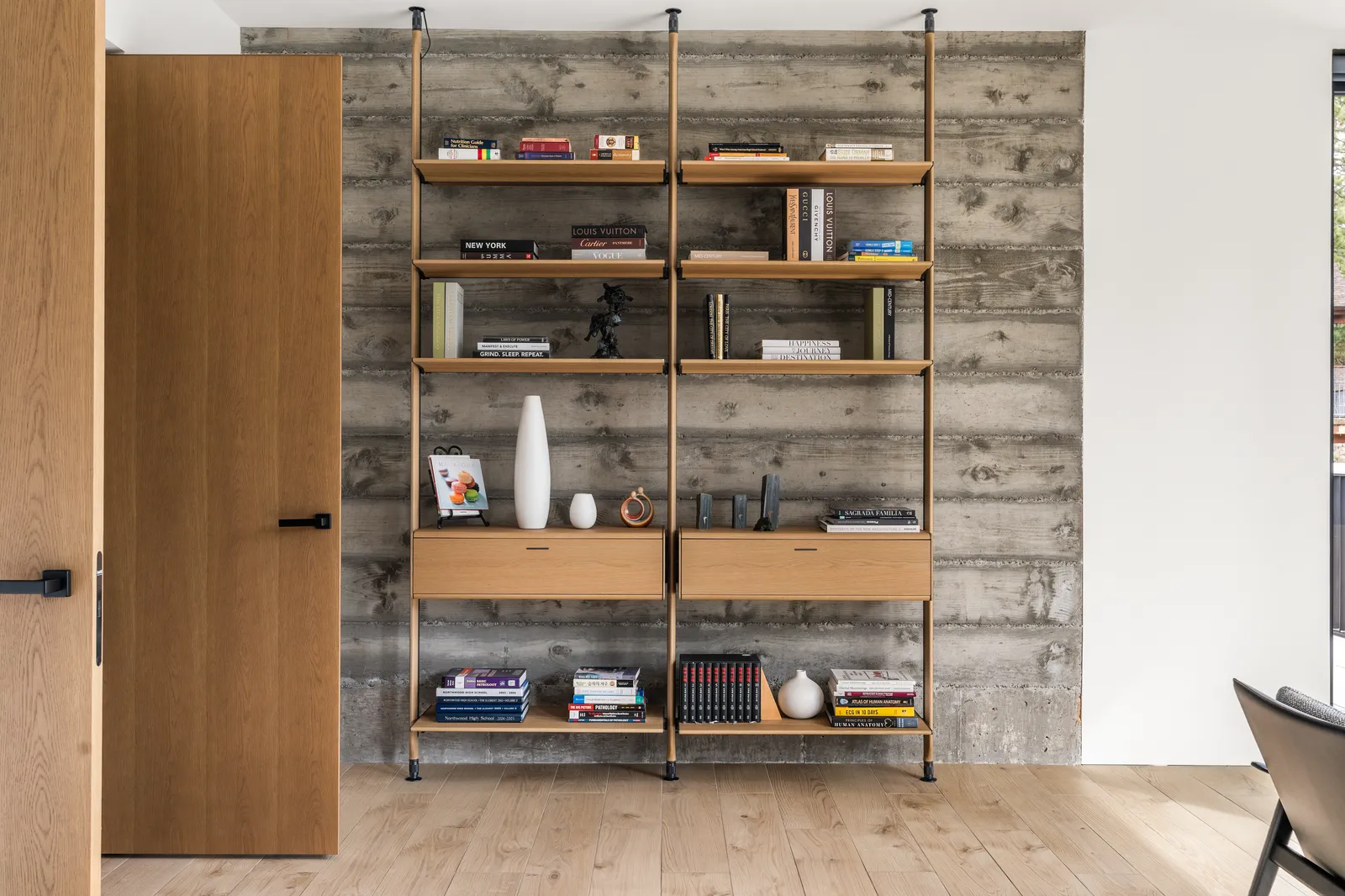Open shelving on a reclaimed wood wall